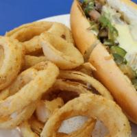 Grilled Steak Hoagie · Grilled Philly steak, grilled onions, bell peppers, and mushrooms smothered with melted prov...