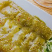 Enchiladas Suizas · 3 steak or grilled chicken enchiladas topped with green tomatillo sauce. Served with lettuce...