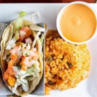 Tacos Del Mar · 3 grilled shrimp or mahi-mahi tacos with cabbage and pico de gallo. Served with a side of ri...