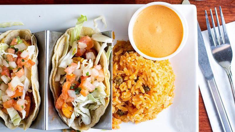 Tacos Del Mar · 3 grilled shrimp or mahi-mahi tacos with cabbage and pico de gallo. Served with a side of rice.