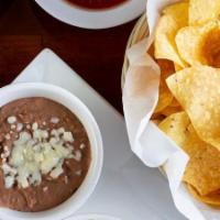 Dip Trio · A combination of our refried beans, queso Blanco, and guacamole. Please note that no modific...