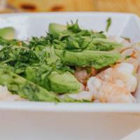 Ceviche · Marinated shrimp with fresh cilantro onions and tomatoes topped with sliced avocado served w...