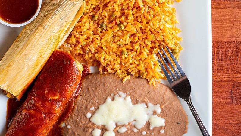 El Vaquero · A pork tamale, beef enchilada, beans, and rice.