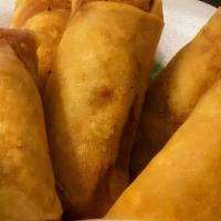 Egg Rollz (2)  · Home-made traditional pork, shrimp & vegetables. Wrapped then deep fried. Served with house ...