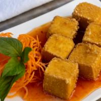 Crispy Tofu (5) · Vegetarian. Deep fried tofu with sweet chili sauce vegetarian option.