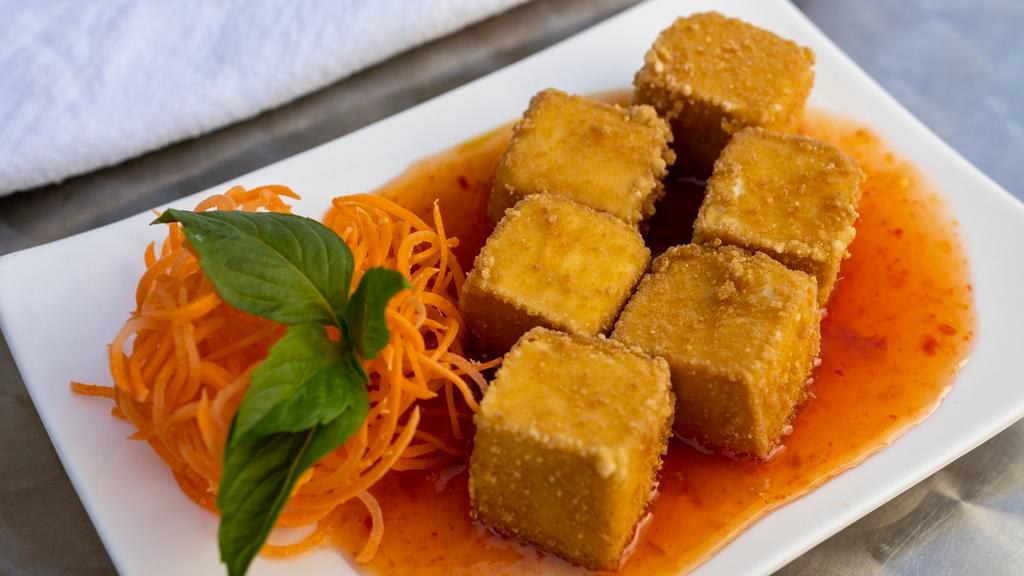 Crispy Tofu (5) · Vegetarian. Deep fried tofu with sweet chili sauce vegetarian option.