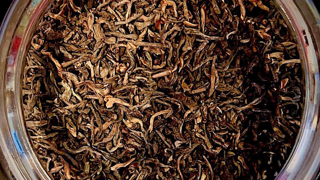 Pu-Erh Small Leaf Tea · A loose, small leaf pu-erh tea (also spelled puer and puerh). pu-erh small leaf tea yields a dark auburn cup that is sweet and earthy with a bright woody/bark-like character. This is shou (cooked/ripened) not sheng (raw/green) pu-erh. Loose pu-erh tea (also known as dark tea) is prepared through varying steps of sun fixation, rolling, piling, drying, compressing and aging. pu-erh can be brewed multiple times and for longer periods of time. it's also considered to be a tea that improves with age and never gets bitter. Our pu-erh small leaf tea has an earthy, yet sweet flavor that produces a dark auburn color.