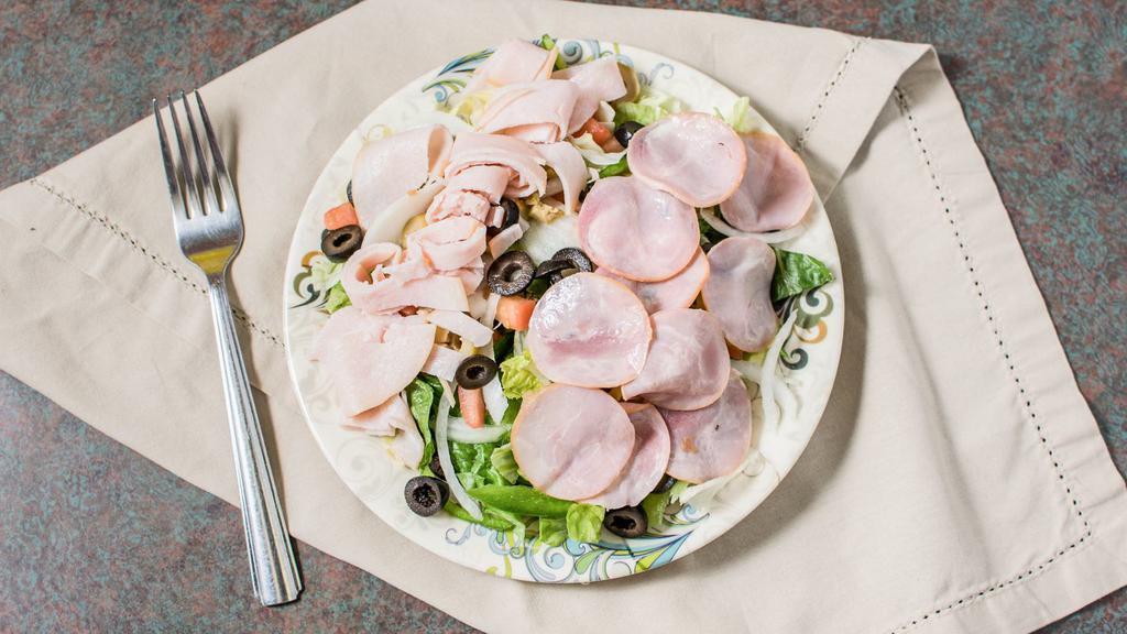 Chef Salad · House salad with turkey and ham.