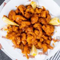 Hooters Original Buffalo Shrimp · 12 hand-breaded shrimp tossed in your favorite wing sauce. tender inside crispy outside.