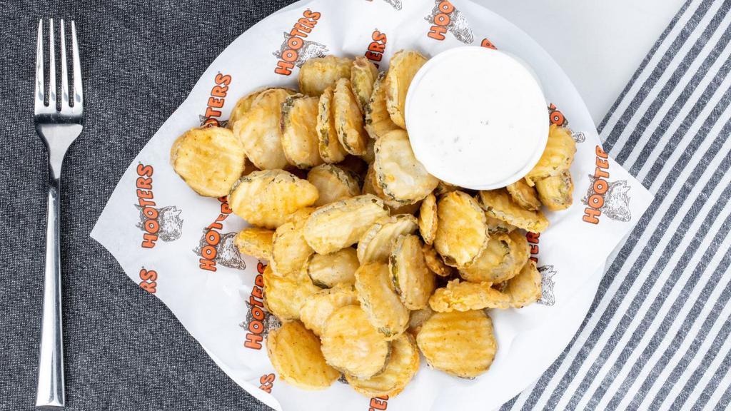 Fried Pickles · Hand-made to order and served with our signature tangy dipping sauce.