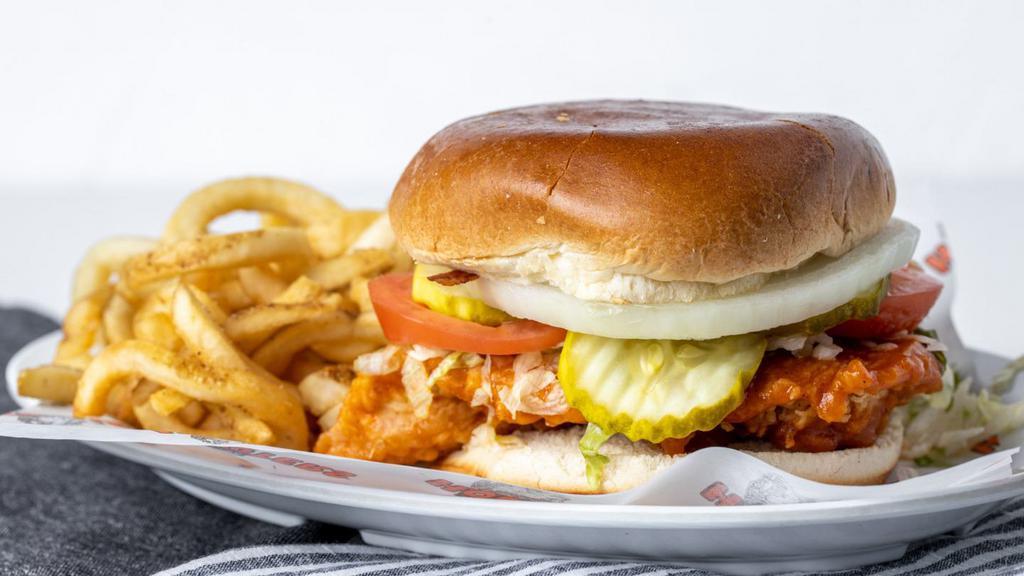 Hooters Original Buffalo Chicken Sandwich · Everything you love about our wings, but in a sandwich. Hand-breaded chicken breast tossed in your favorite wing sauce and served on a toasted brioche bun. Served with a side.