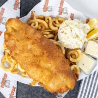 Fish & Chips · Battered and fried to crispy perfection. Served with housemade coleslaw, fries, and tartar s...