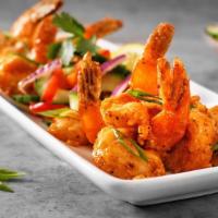Spicy Shrimp · fried shrimp with a  spicy cream sauce and cucumber salad