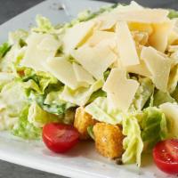 Caesar Salad · fresh romaine hearts, romano cheese, creamy caesar dressing, shaved parmesan