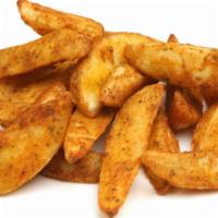 Potato Wedges · Thick-cut potatoes fried to perfection.