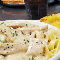 Lunch Combo #5 Chicken Alfredo · Lunch portion of chicken Alfredo with garlic bread and a soft drink