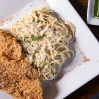 Bc Chicken Alfredo · Two pieces of crispy fried chicken breasts served on thin spaghetti in alfredo sauce. A side...