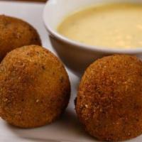 Cheese Balls (6) · 6 pieces of fried cheese balls with mozzarella, cheddar cheese, bacon, and broccoli.  Served...