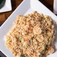 House Shrimp Fried Rice · Fried rice with seasoned shrimp, egg, garlic, and onion.
