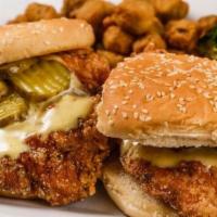 Chicken Sandwich (1 Sandwich, 1 Side) · Golden fried chicken breast served with pickles, lettuce, and our homemade honey mustard dre...