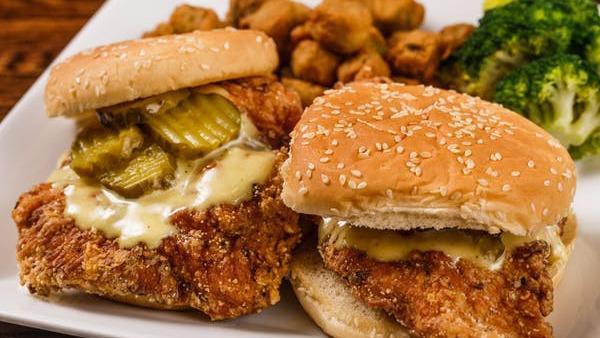 Chicken Sandwich (1 Sandwich, 1 Side) · Golden fried chicken breast served with pickles, lettuce, and our homemade honey mustard dressing (on the side). Sandwich come with 1 side of your choice.