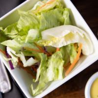 House Salad · Served with our honey mustard salad dressing.