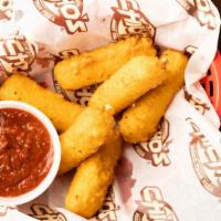 Mozzarella Sticks · Breaded Mozzarella Fried until golden brown and served with your choice of Hot n Spicy or  T...