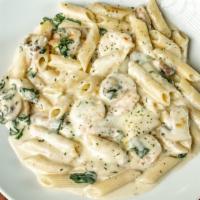 Baked Shrimp Florentine · Shrimp and spinach, garlic, fresh basil, mushrooms in an Alfredo sauce topped with mozzarell...