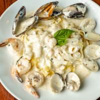 Seafood Combo #2 · Fresh garlic and basil, shrimp, mussels, chopped clams, scallops and calamari in white wine ...
