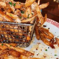 Tuscan Fries · Garlic, parmesan, and crushed red pepper.
