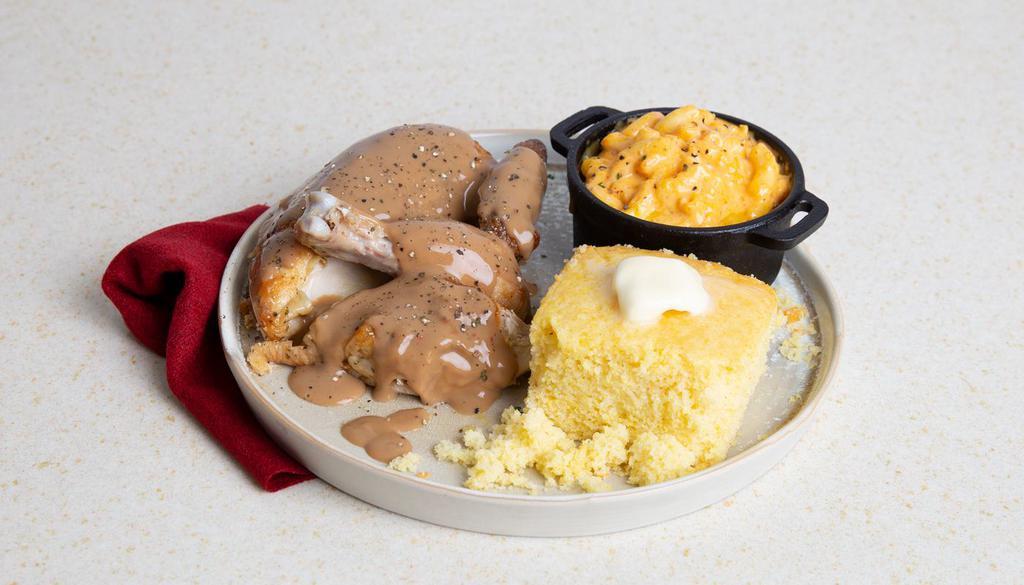 Smothered Chicken · Seasoned roasted chicken with gravy, and your choice of two sides.
