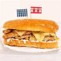 Philly Chicken Cheesesteak · Chopped chicken sandwich with grilled onions and your choice of cheese.