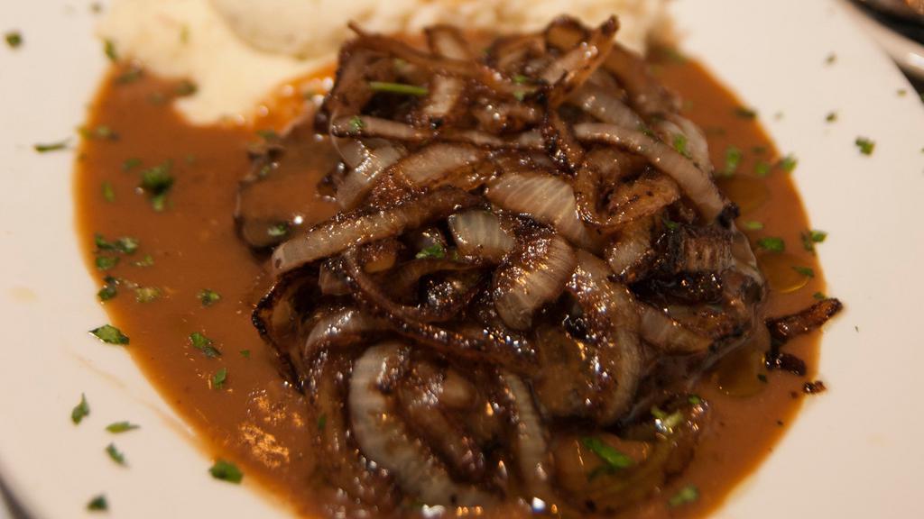 Hamburger Steak · Smothered with gravy and onions.