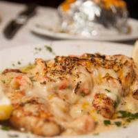 Catfish Bienvenu · Farm raised catfish grilled and topped with our crawfish cream sauce.