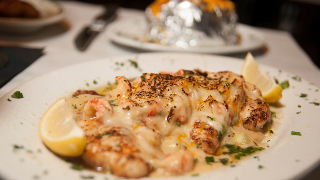 Catfish Bienvenu · Farm raised catfish grilled and topped with our crawfish cream sauce.