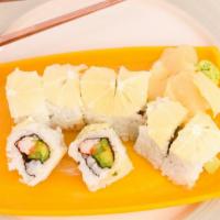 Lemon Roll · Crab, cucumber, and avocado with sliced of lemon on top. One roll served as eight pieces.