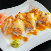 Derby Roll · Spicy crab with steamed scallop and shrimp on top. One roll served as eight pieces.