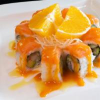 Orange Salmon Roll · Crab, cucumber, avocado with salmon on top.One roll served as eight pieces.