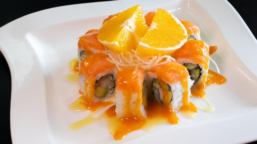 Orange Salmon Roll · Crab, cucumber, avocado with salmon on top.One roll served as eight pieces.