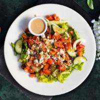 Big Fat Greek Salad · (Vegetarian) Romaine lettuce, cucumbers, tomatoes, red onions, olives, and feta cheese tosse...
