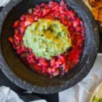 Casa Brava Sampler · Two chicken taquitos, one beef quesadilla, one chicken quesadilla and guacamole dip.