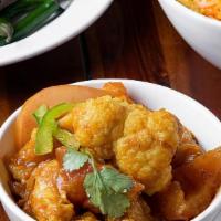 Aloo Gobhi · Potatoes and cauliflower cooked in Indian spices.(DAIRY FREE)