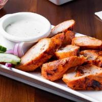Chicken Tikka Dry  · Thick and juicy cubes of chicken roasted in our tandoor oven. (WHITE MEAT)