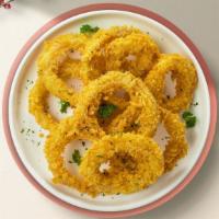 Onion Ring Around The Corner · Onions dipped in a light batter and fried to perfection