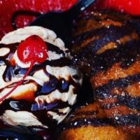 Deep Fried Oreos · Battered and fried, drizzled in chocolate syrup and topped with powdered sugar and a scoop o...