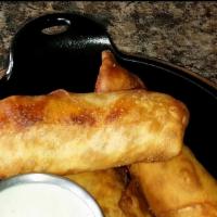 Buffalo Chicken Eggrolls · Popular. Shredded buffalo chicken with a blend of cheeses in a light crispy crust served wit...
