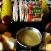 Grilled Sausage & Cheese Platter · Smoked sausage, Cheddar, and Pepper Jack, pepperoncinis, and pickles, with honey mustard.