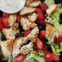 Berry-Poppy Seed Salad · Grilled chicken, strawberries, blueberries, pecans, cheddar & mozzarella cheese on a bed of ...