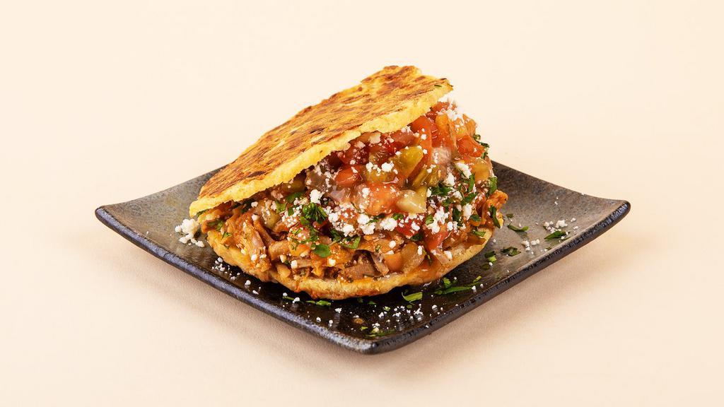 Rojo Arepa · Your choice of protein with shredded cheese, pico de gallo, and cilantro between two warm, fresh arepas.