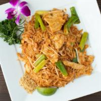 Pad Thai · Stir fried thin rice noodles with shrimp, chicken, greem, onions, bean sprots, eggs, and gro...